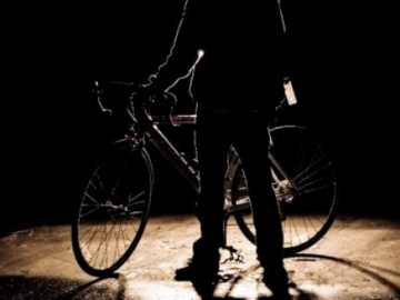 Man standing with bike